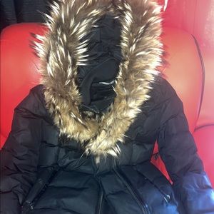 This is a lovely well fit black mackage authentic coat size M in woman’s.